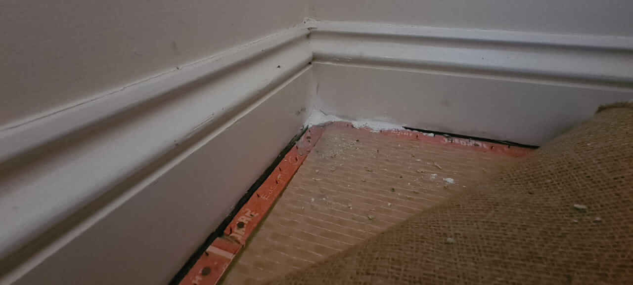 Cable run with entry into wall filled